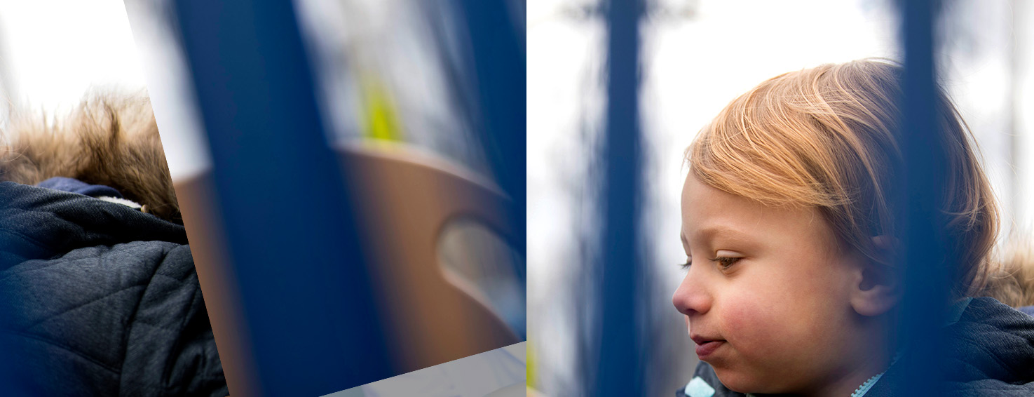 Close up of the face of a toddler looking left